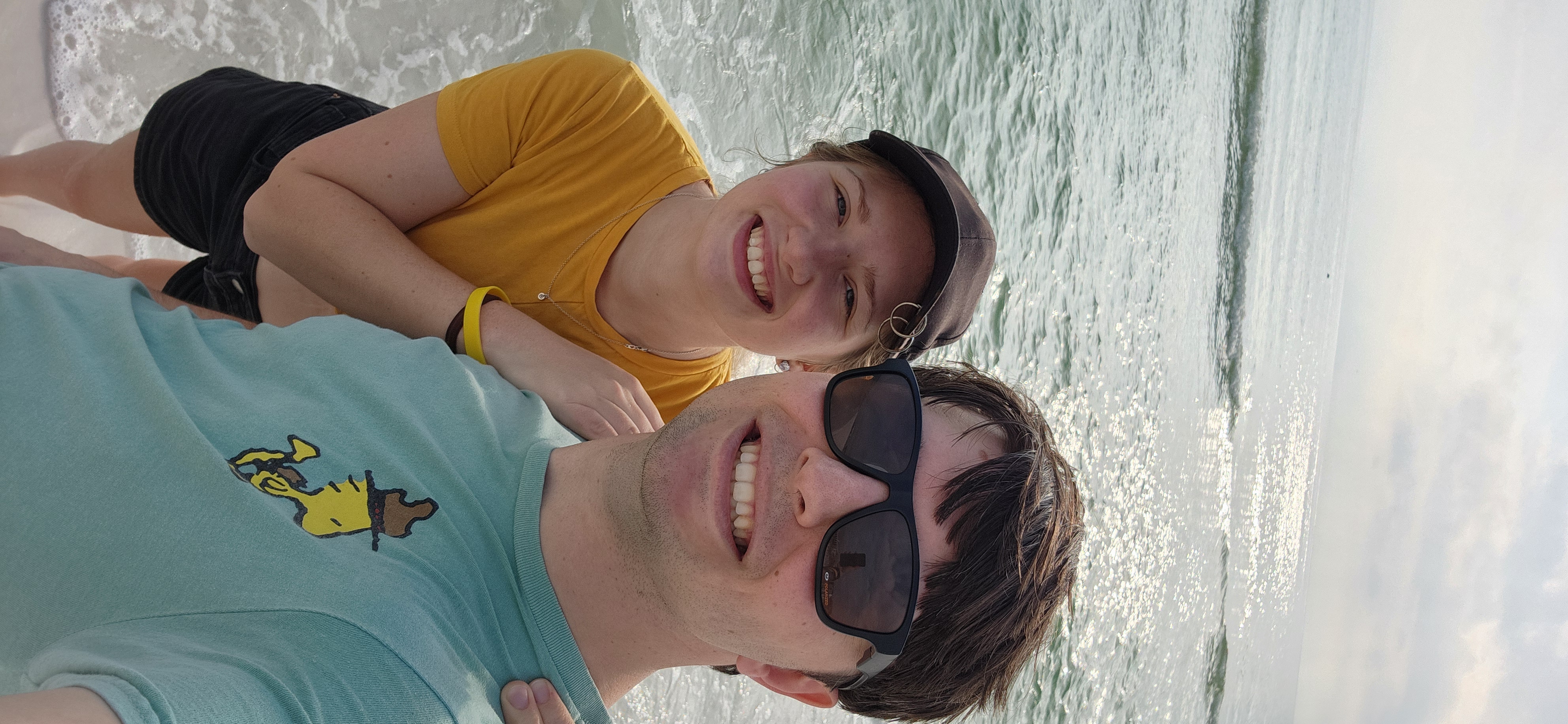 Jessica and FC standing by the water at the Gulf of Mexico.